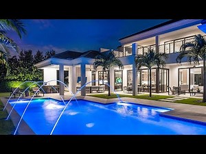This $15,000,000 ROYAL PALM HOUSE in Boca Raton offers a slice of paradise with an amazing backyard