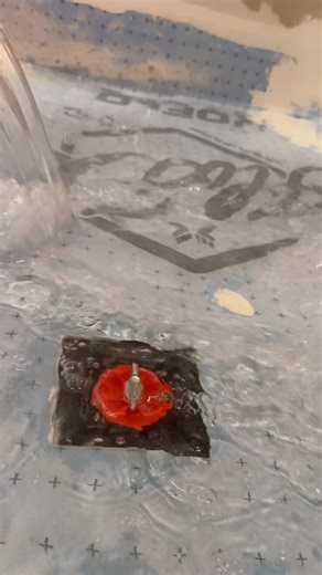 Shower pan water test — held water for 48 hours. Patched little bubble spot to be safe. Tile next.