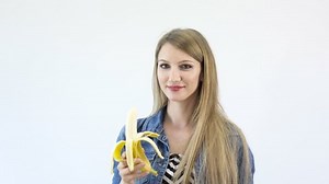 Beautiful Girl Eats Banana On White Stock Footage Video (100% Royalty-free) 16443253 | Shutterstock