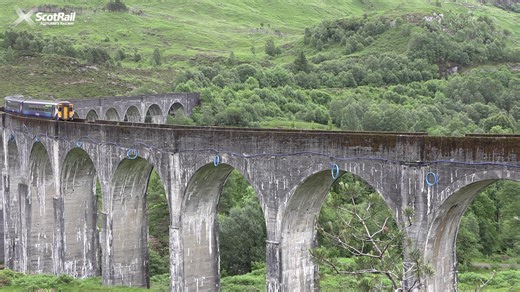 It's one of the world's most iconic views - the Glenfinnan Viaduct with a train travelling across it. This is a Class 156 on its way to Mallaig on the wonderful West Highland Line. | ScotRail
