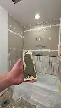 My first time tiling a shower😭