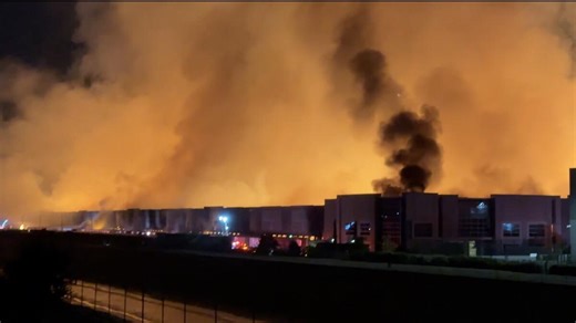 Arson Suspect Arrested After Fire Engulfs Major Company's Warehouse