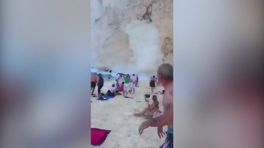 Shocking moment cliff collapses on Zante' beach in Greece