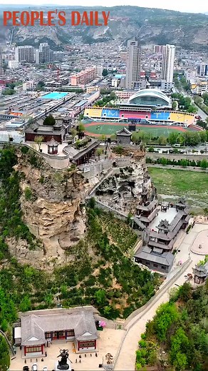 71K views · 1.4K reactions | Take a look at the captivating view of various structures stretching along the over 1,000-meter-long ridge of Erlang Mountain in Shenmu, northwest China's Shaanxi Province. | People's Daily, China | Facebook