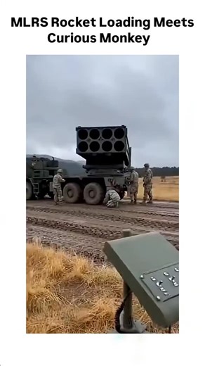 its_trand on Instagram: "In the heat of military operations, a team of soldiers methodically reloads the massive M270 Multiple Launch Rocket System — one of the most feared rocket artillery platforms in modern warfare. The launcher pod, loaded with 12 deadly 227mm rockets, towers over the muddy terrain as troops in camouflage work efficiently: one kneels to secure components, others coordinate around the raised armored pod under a gloomy, overcast sky.But then comes the unexpected twist that tur