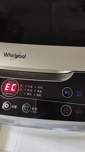 Whirlpool washing machine error code EC, related to water level or electronic control panel.