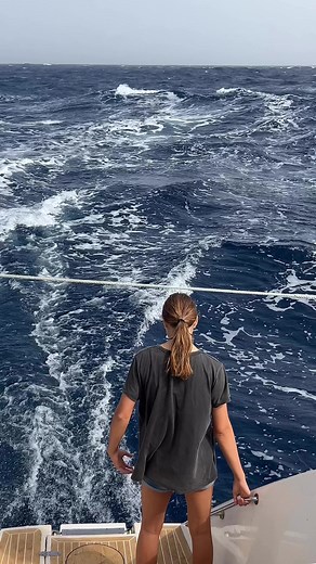 Waves are building; we’re rolling along at 8.5kts! #crossingtheatlantic #fastsailing #livingthedream #yesitwassafe #noshedidntfalloff | Sailing Zatara
