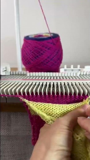 Making a sock on the knitting machine.