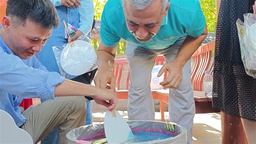 4.5K views · 14 reactions | A group of foreign friends in China's coastal province of Hainan have embraced the craft of making traditional Chinese lacquer fans. Discover the delicate swirls and unique methods that transform each fan into a unique work of art. | Xinhua Culture&Travel | Facebook