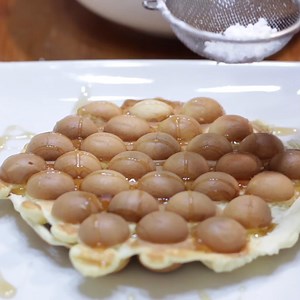 Learn how to make bubble waffles. These are very popular in Hong Kong. It is one of their top street foods. #hongkong #bubblewaffles #eggwaffles #eggettes | In The Kitchen With Matt