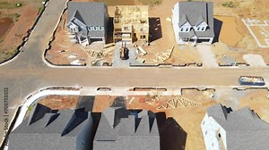 New residential area at in Leesburg, Virginia. Finished and unfinished houses. View from a flying drone.