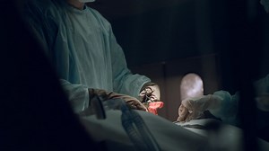 Surgeon performing hard operation taking out bloody tampon in emergency room. | Free Stock Video Footage