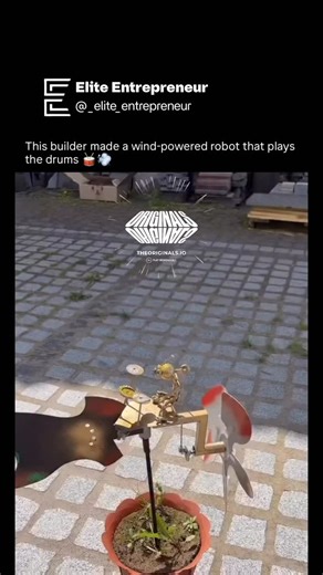 Elite Entrepreneur on Instagram: "Follow (US) @_elite_entrepreneur 🌟to learn something new every day 🧠📈 Every time the wind rises, this robot springs to life and begins drumming on its own. Powered entirely by moving air, it uses carefully designed gears, shafts, and linkages to convert wind energy into motion, driving its arms in a steady, mechanical rhythm. There are no batteries, no electronics, and no code running in the background. Everything happens through pure mechanical design, where