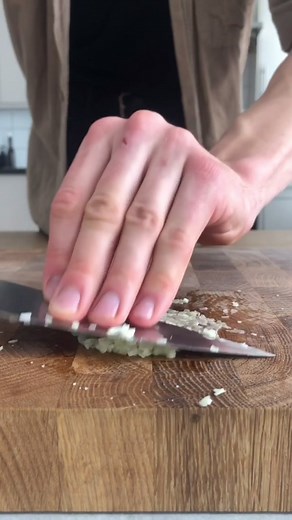 How to Crush Garlic with a Knife: Beginner's Guide
