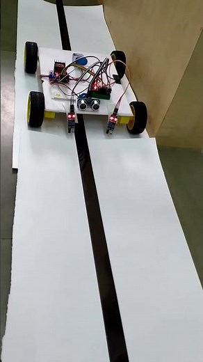 ARDUINO LINE FOLLOWING ROBOTIC CAR WITH OBSTACLE DETECTION