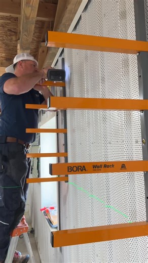 Dustin Mitchell on Instagram: "Did some rearranging in the shop and moved the mitre saw to a new location and installed the @bora_tool wall rack to keep all the extra cut off pieces that “I’ll use later” organized and off the floor"