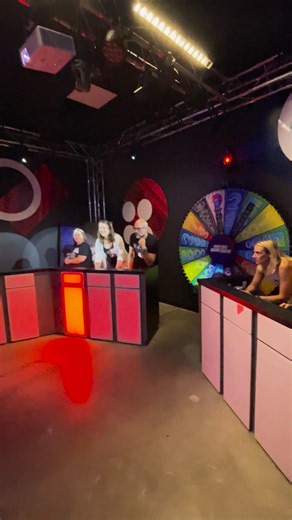 A game show for your friends and family! Get ready for: 🕺 A Live Game Show Host 🎉 The BIGGEST wheel you have ever seen (probably) 🚨 Fully decked out sound stage with lights and music Brought to you by the creators of The Escape Game, experience the energy of a live game show with lights, music, buzzers, and a live host. Score points, earn bragging rights, and have a blast! Grab your crew and book your game today! | Great Big Game Show