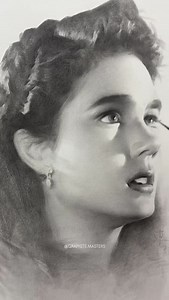 Captured Expression: The Art of Fleeting Emotion In this sensitive graphite portrait by Xiaodong (Douyin), we witness the medium's exceptional capacity for capturing transient emotional states. The artist demonstrates sophisticated understanding of how subtle shifts in facial expression—the slight parting of lips, the direction of gaze—can convey complex psychological moments. Notice the masterful handling of soft transitions between light and shadow, particularly in modeling the facial planes w