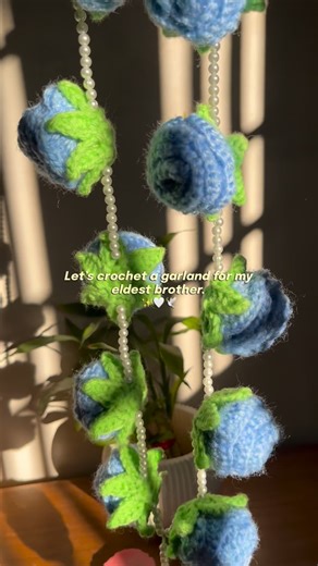 Prettyknot on Instagram: "My dad asked me to make a crochet garland for my older brother who we left us before I was born, and this is how the rose crochet garland turned out. . . . . . . . . . . . . . . . . . (Crochet flower garland, small business owner, small business, handmade crochet garland)"