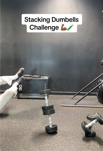 Stacking Dumbbells Challenge: Who Emerged Victorious?