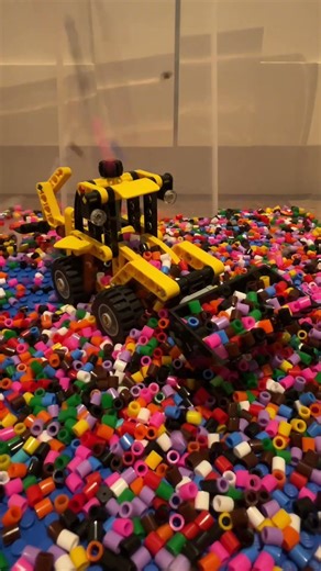 LEGO® Backhoe loader and the Beads Rain #lego #asmr #beads #reverse