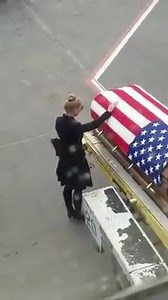 Airline passengers in Raleigh were asked to wait while fallen soldier, Officer Shawn Thomas, was carried off of a plane in a flag-draped coffin. Lisa West Williams posted the video on her Facebook page. In it you can see the soldier's widow place her hand on the coffin before bowing her head. Thomas was stationed at Fort Bragg but died in a non-combat accident in Niger on Feb. 2. He is survived by his wife and their four children. "It was an honor to fly home with this PATRIOT! God bless his wif