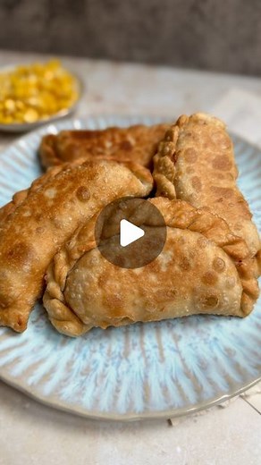 Marta - Recipes & London eats on Instagram: "3-ingredient empanadas 🥟 . After my VIRAL plantain empanada I had to made the traditional version. I’m using my grandma’s recipe that uses just 3 ingredients (flour, water and olive oil) and takes less than 10 min to make! I’m filling them with my favourite Argentinian humita: cheesy corn and onion but you can be creative and stuff them with anything you want! . Full RECIPE on my BIO or by typing truffleandegg.com in your browser 🥰 . #recipereel #ea