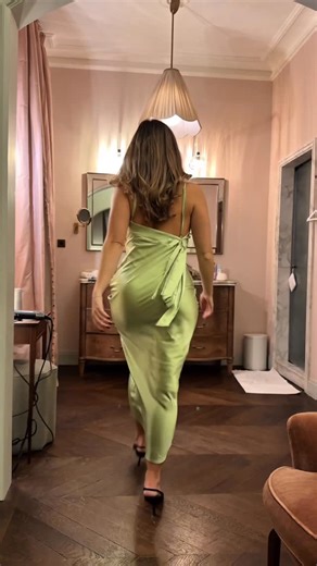 Elle Edwards on Instagram: "ad A moment for the dress 💚 There's something about getting ready in Paris ✨💄 Dress @revolve Born in Roma Donna Ivory @valentino.beauty Make me blush shade 93 @yslbeauty Gloss Bomb Switl twisted lip luminizer @fentybeauty #paris #grwm #dress #makeup #fragrance"