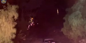 Saved from the flood: Rescuers tell of harrowing conditions as they plucked driver from raging waters