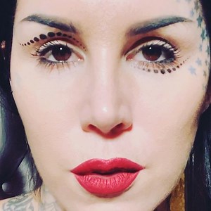 Thank you to everyone who commented on the makeup look I created for the red carpet at the @mercyforanimals gala. Believe it or not, this simple dot look took forever to get right, using lots of teeny tiny brushes and q-tips. But none the less, I enjoyed such a simplistic layout and had fun playing off of how asymmetrical my face already is to begin with! Can’t wait to see your recreations! ⚫️⚫️⚫️ | Kat Von D