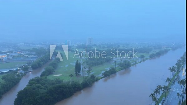March 2026 Kona storm. Ala Wai Canal Floods after heavy rain. Waikiki, City of Honolulu, Ohau, Hawaii winter. Koʻolau Range (shield volcano). Kona storm. Golf Course.