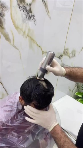 A young man who had been complaining his whole life about severe headaches that hit him every time he washed his hair with water, and when he went to the doctor, he told him he had to cut his hair completely... and after he did that, he was shocked by what was under the hair.