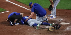 Springer exits in 9th vs. O's after HBP on back of helmet