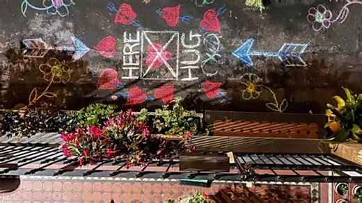 "Hug Here" Chalk Art Creates Heartwarming Moments