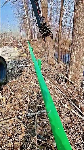 Masterful Operator: Clamp Excavator Saves Guardrail with Perfect Timing