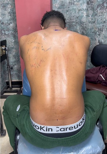 Ethiopian Back Lion Tattoo by Skilled Artist