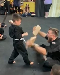 This little boy was ready to give up, but his sensei wasn't about to let him. 🥋 | Humankind