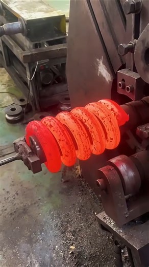 forging process making big spring #steels #automobile #forgingprocess #making #shortsfeed #springms