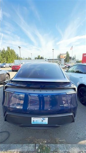 New Tesla Model Y Refresh 2025 in Deep Blue Metallic Paint