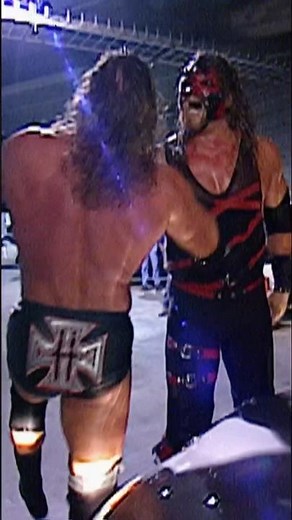 Kane chokeslams Triple H onto a car!! 🚗