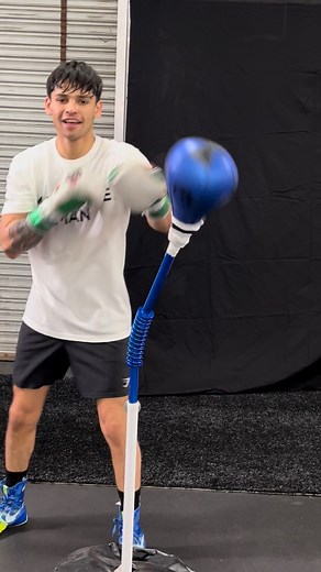 Ryan Garcia on Instagram: "Ended up kissing the bag today 😭🔥🥊 Having a little fun only 3 weeks away from the fight 😱😱 Tickets are available and don’t forget the fight will be live on @daznboxing @gymshark @marlowe.skin @goldenboy Get excited the return is near…. LETS GOOOO"