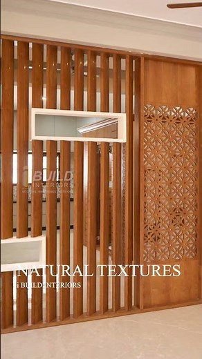 Elevate your space with our custom partition featuring intricate CNC jali design in veneer finish