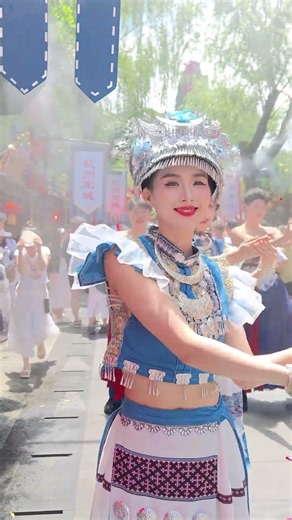 The Miao girls' flash mob performance was so energetic and beautiful! I loved watching it!