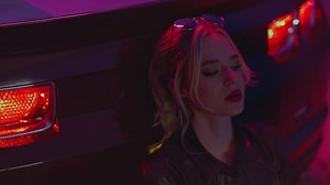 Stylish woman smoking sitting next to sports car - Free Stock Video