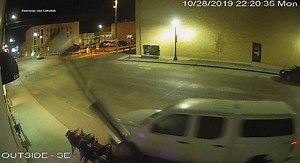 A reckless driver barreled through a downtown Minot street light Monday night, narrowly missing several buildings, and the accident was caught on a bar owner’s surveillance footage. https://bit.ly/31Yj4mh | KMOT