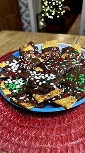 What a cute Christmas activity! We thought these chocolate-dipped graham crackers tasted like Keebler Fudge Stripe cookies! They were so simple and fun to make, and would make a great Christmas activity for your kids or your adults. We used some variety Christmas sprinkles, but you could also use some red and green icing! We think it would be fun to try using white chocolate and/or some peppermint extract! | Autistic Interpretations