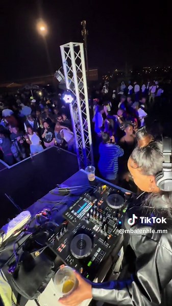 DJ Performance at Outdoor Night Event