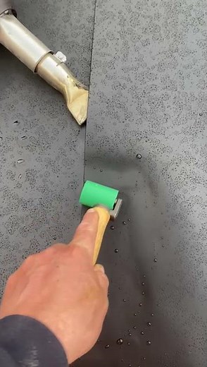 Welding the seal of a geomembrane liner for an attenuation tank in Cambridgeshire