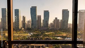 View of Modern high-rise building with traditional hotel in Songdo central park in sunrise morning