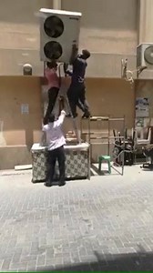 Ladder Safety and lifting heavy equipment is certainly not a consideration here! | Health & Safety Publications